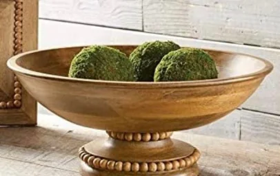 Greenery in a wooden dish