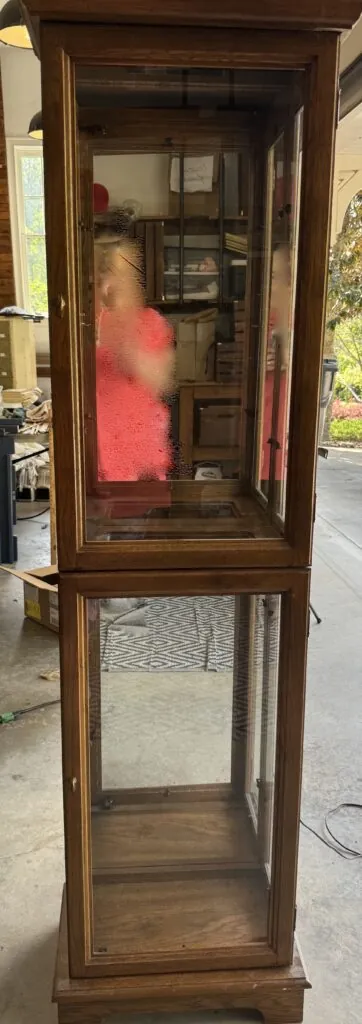 Curio cabinet before photo